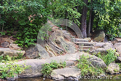 The outdoor rock stairs at Historic Yates Mill County Park Stock Photo