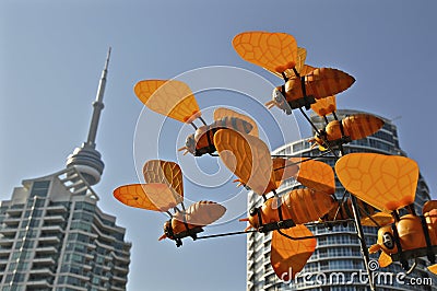 Outdoor sculpture of bees with the urban city background Editorial Stock Photo