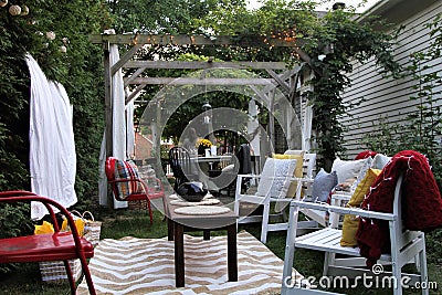 Outdoor seating arrangement with gazebo in background Editorial Stock Photo