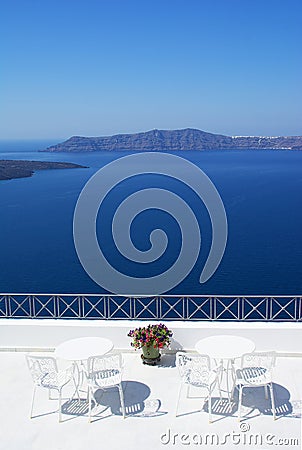 Outdoor seating at the terrace,Oia,Santorini island, Caldera, Ae Stock Photo