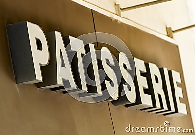 Outdoor sign of a French cake shop - patisserie Stock Photo