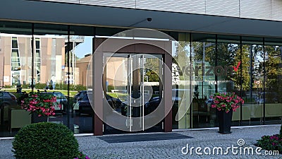 Glass facade of a modern office building with Verizon Communications logo. Editorial 3D rendering Editorial Stock Photo