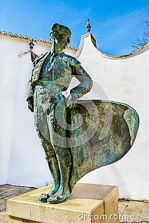 Outdoor statue of bullfighter Cayetano Ordonez in front of the bullfighting arena in Ronda, Andalusia, Spain Editorial Stock Photo