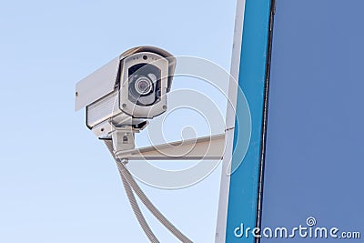 Outdoor surveillance camera against the sky Stock Photo