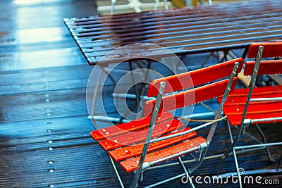 Outdoor terrace chairs and tables in raindrops Stock Photo