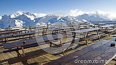 Outdoor terrace of a mountain restaurant in the Alps Stock Photo