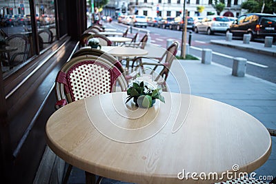 Outdoor terrace of restaurant in the street Stock Photo