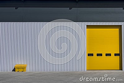 Outdoor warehouse painted bright yellow and gray Stock Photo