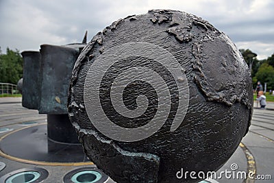 Outdoors exposition of planets sculptures. Earth Planet Editorial Stock Photo