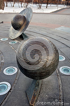 Outdoors exposition of planets sculptures. Earth Planet Editorial Stock Photo