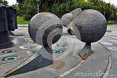 Outdoors exposition of planets sculptures. Editorial Stock Photo
