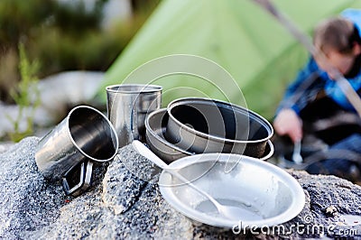 Outdoors man cooking Stock Photo