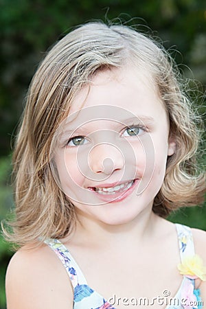 Portrait of a beautiful happy liitle girl close-up Stock Photo