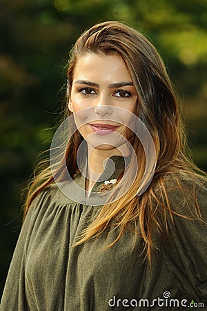 Outdoors portrait of emotional young beautiful young woman. Stock Photo