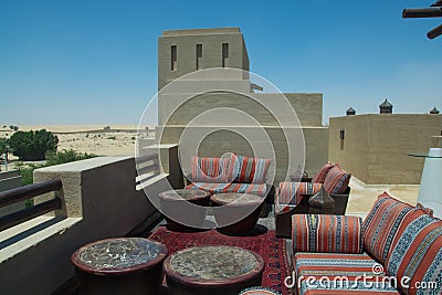 Outdoors restaurant comfortable lounge on the top of the roof at luxury arabian desert resort Stock Photo