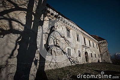 Outer skin or facade of an older romanic castle at Krumperk, close to Krtina or Domzale in Slovenia on a sunny day Stock Photo