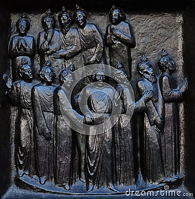 The outpouring of the Holy Spirit on Pentecost, relief on the door of the Grossmunster church in Zurich Stock Photo