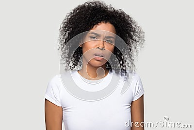 Outraged dissatisfied African American woman looking at camera Stock Photo