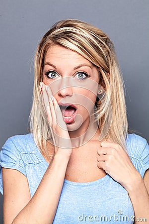 Outraged woman with mouth opened expressing regret Stock Photo