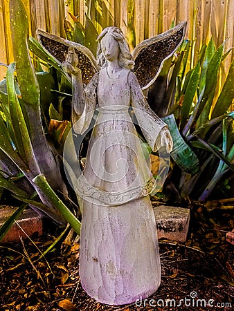 Angel in the Garden. Stock Photo