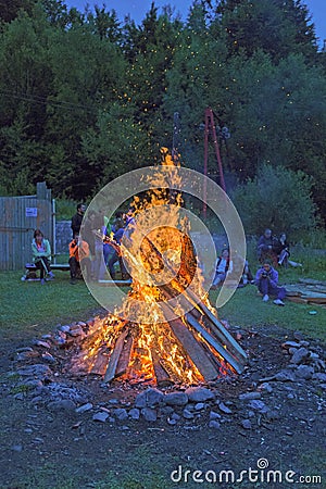 Outside fire in a camping base Editorial Stock Photo