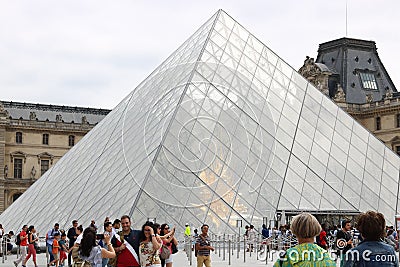 outside louvre in paris tourists Editorial Stock Photo