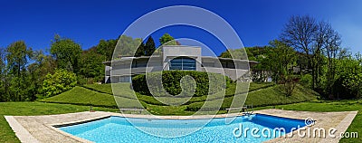 Outside of modern house in summer, swimming pool Stock Photo