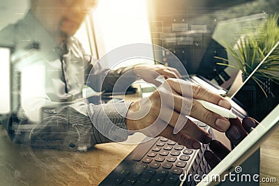 Outsource Developer working on marble Desk Working Laptop Computer Mobile Application Software and digital tablet dock smart Stock Photo