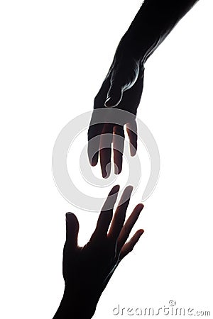 The outstretched hands of women and men, rescue, assistance - silhouette Stock Photo