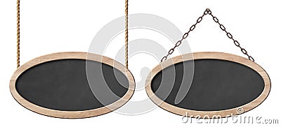 Oval blackboard with bright wooden frame hanging on ropes and chains Stock Photo