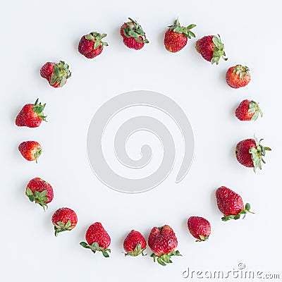 Round frame of strawberries on white background. Flat lay, top view. Size 1x1, square photo Stock Photo