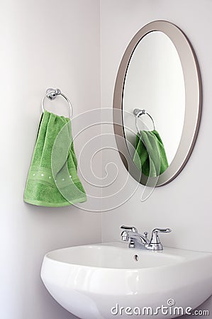 Oval Mirror in Powder Room Stock Photo