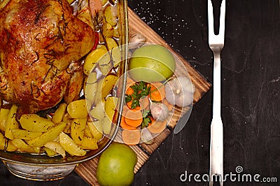 Oven baked apple chicken in a glass dish o Stock Photo