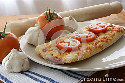 oven baked pizza with organic tomato Stock Photo