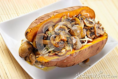 Oven cooked sweet potato Stock Photo