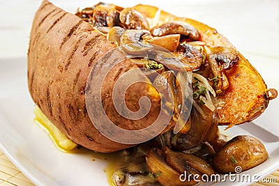 Oven cooked sweet potato Stock Photo