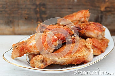 Oven fried chicken legs Stock Photo