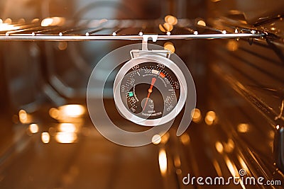 Oven temperature for cooking in new gas oven Stock Photo