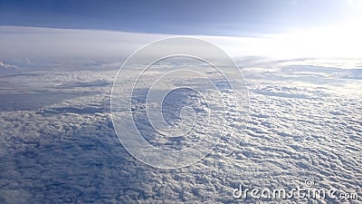 Over Clouds with Blue Sky Above Stock Photo