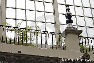 Flowerbed next to window, Casa de los Azulejos, CDMX Editorial Stock Photo