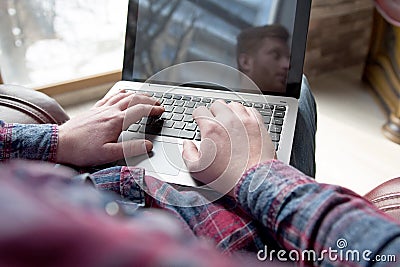 Young guy working at home. Stock Photo