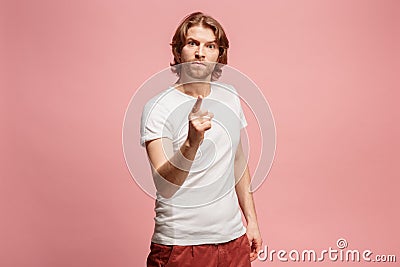 The overbearing business man point you and want you, half length closeup portrait on pink background. Stock Photo