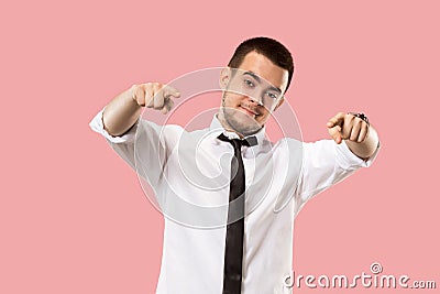 The overbearing businessman point you and want you, half length closeup portrait on pink background. Stock Photo