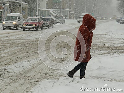 Overcast. Natural disasters winter, blizzard, heavy snow paralyzed city car roads, collapse. Snow covered cyclone Stock Photo