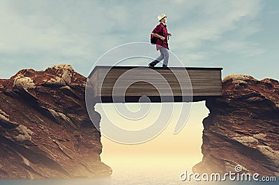 Overcome problems. Book between mountains gap. Stock Photo