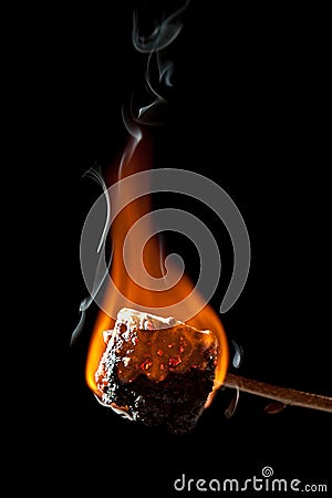 Overcooked Marshmallow Burning and getting all Black Stock Photo