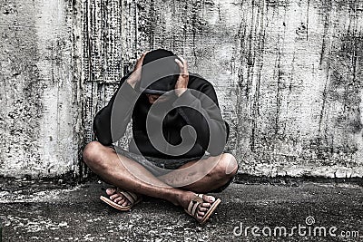 overdose asian male drug addict with problems, man in hood with Stock Photo