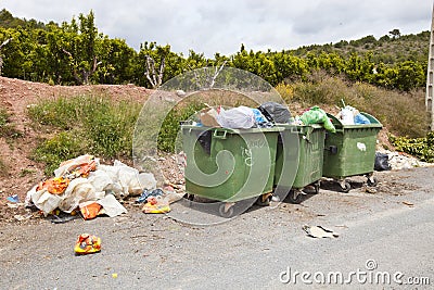 Overflowing bins Stock Photo