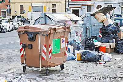 Overflowing garbage bins in a italian city Stock Photo