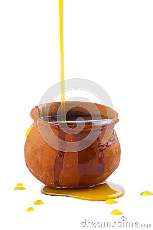 Overflowing Honey Pot Stock Photo